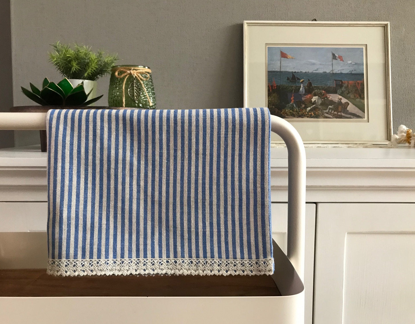 Linen tea towel with lace. Blue stripes