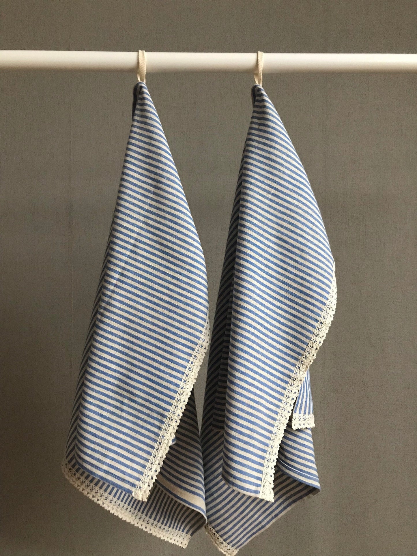 Linen tea towel with lace. Blue stripes