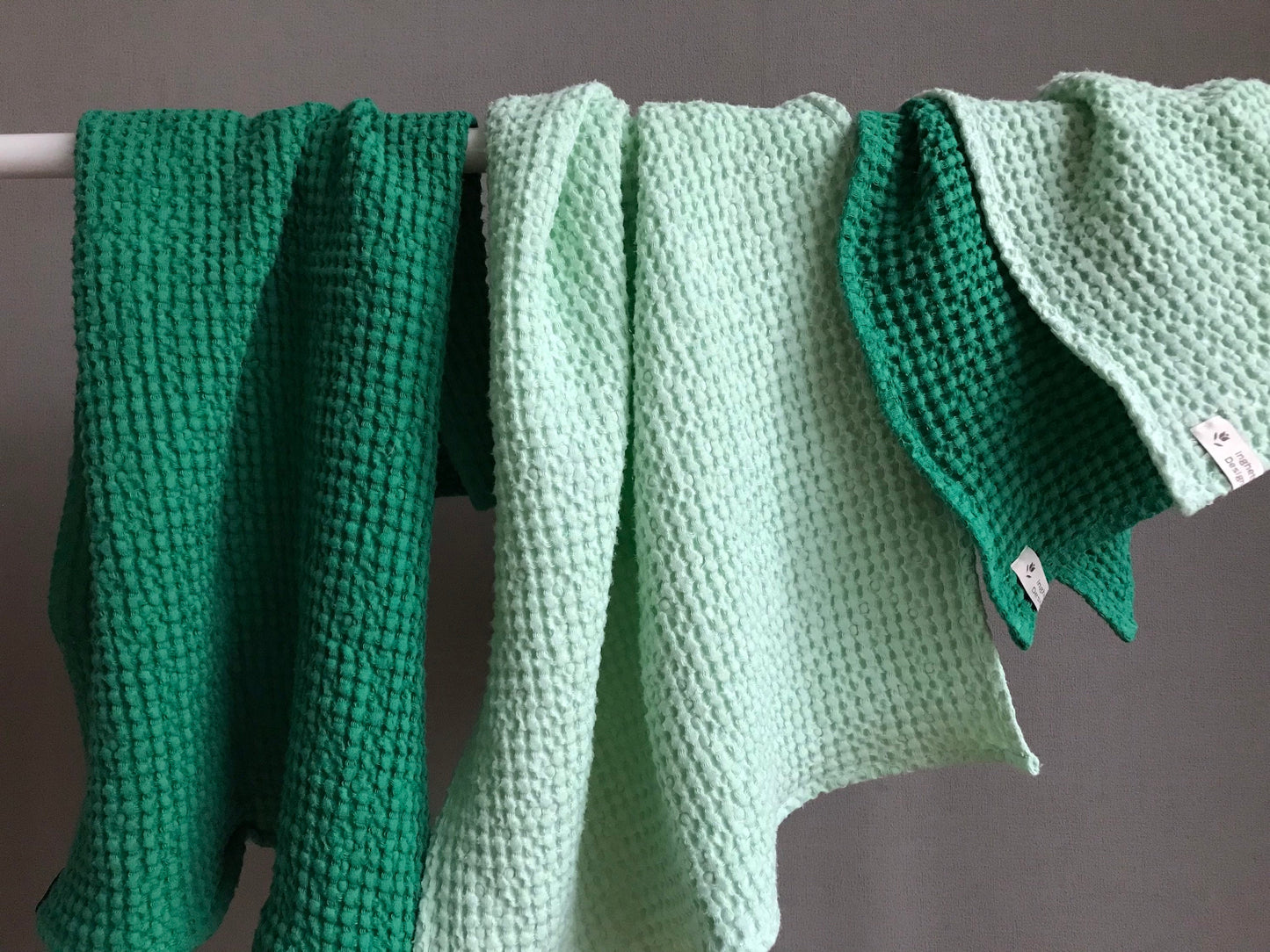Waffle linen bath hand towels. Assorted colors, different sizes.