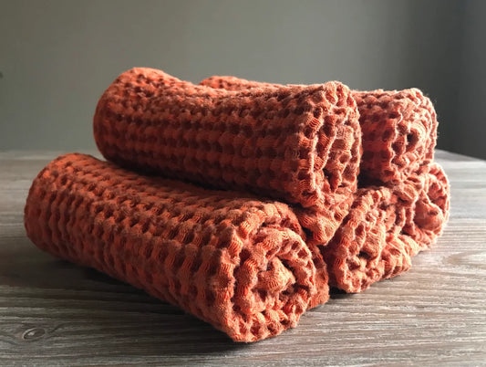 Linen waffle weave fingertip towel. Burnt Orange