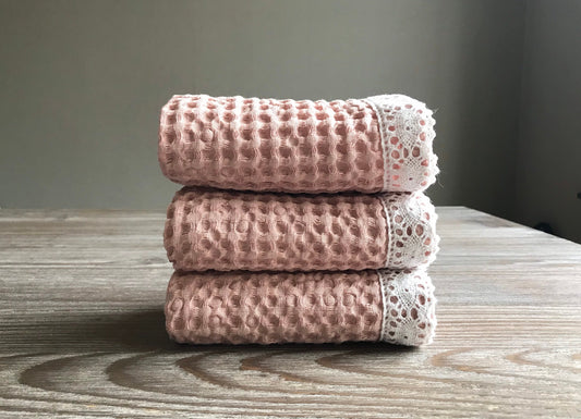 Fingertip waffle towel with lace. Waffle weave linen cotton blend. Light pink.