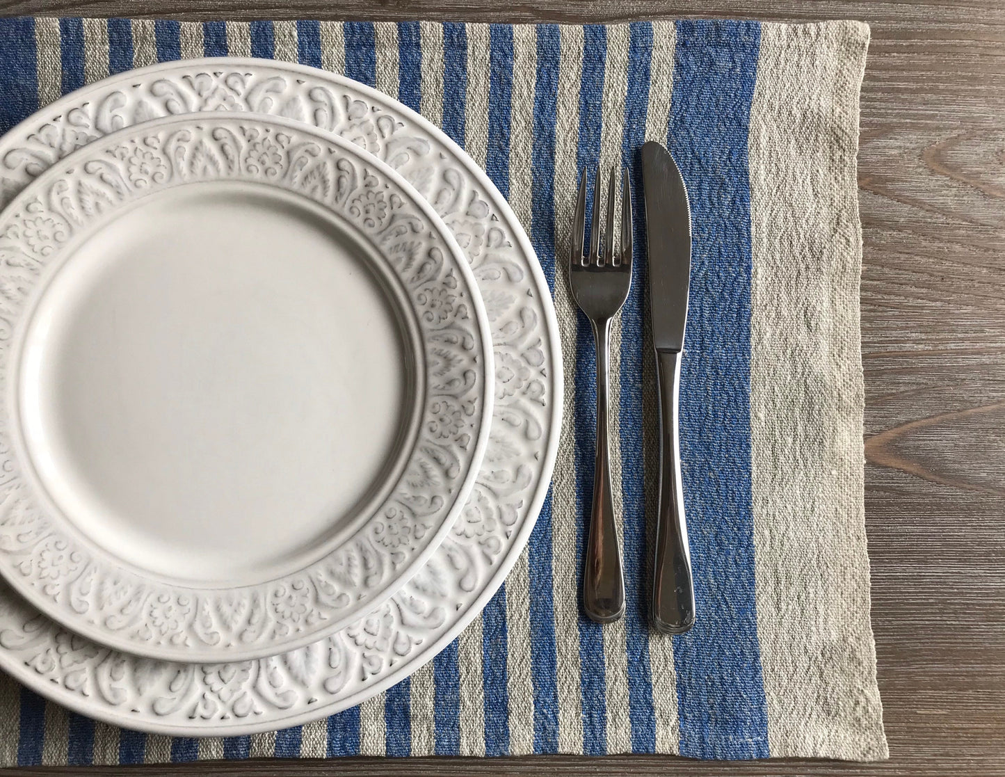 Linen place mat with blue stripes