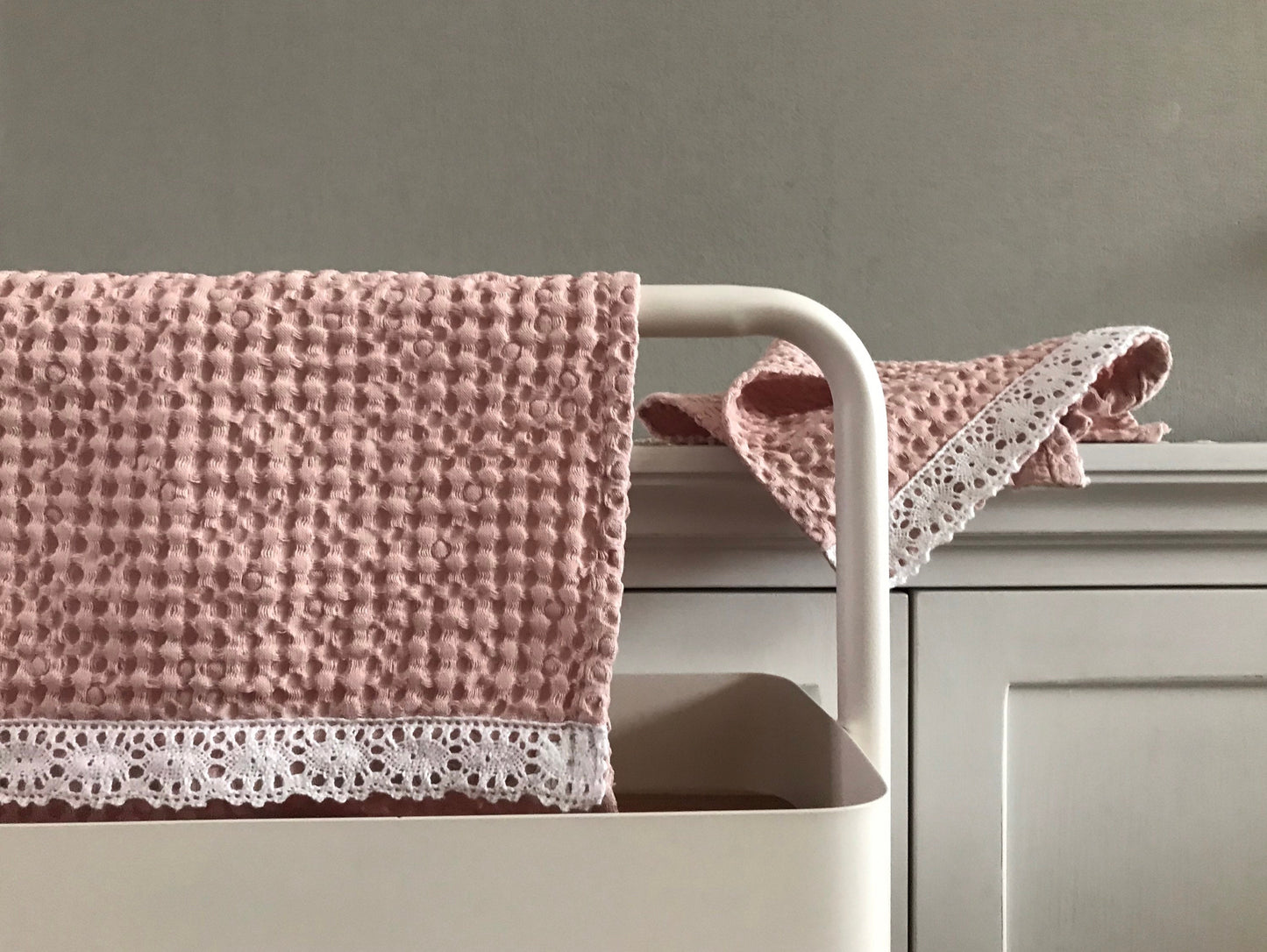 Fingertip waffle towel with lace. Waffle weave linen cotton blend. Light pink.
