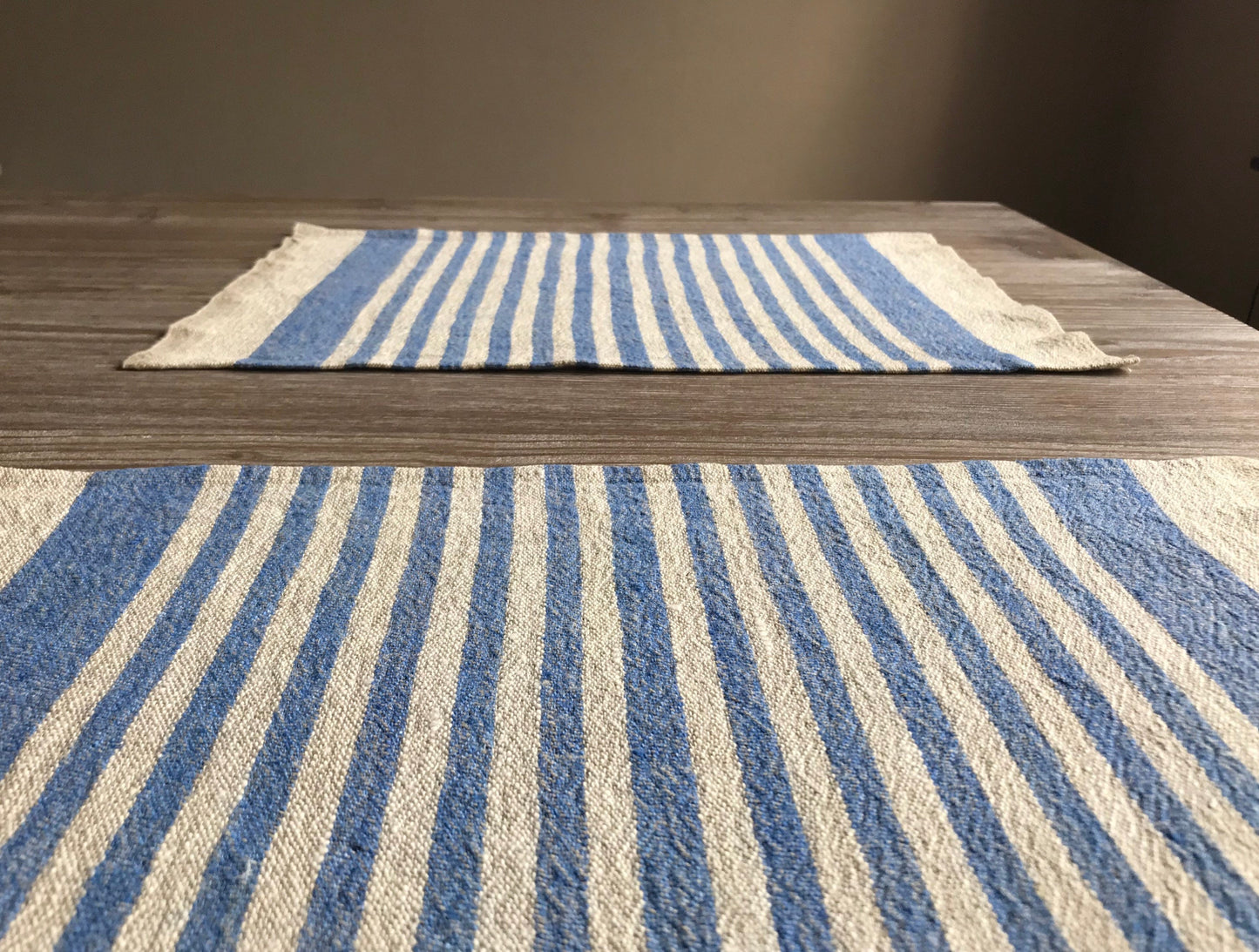 Linen place mat with blue stripes