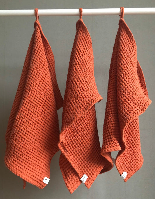 Linen waffle weave towel in different sizes. Burnt Orange