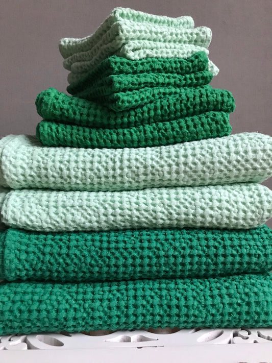 Waffle linen bath hand towels. Assorted colors, different sizes.