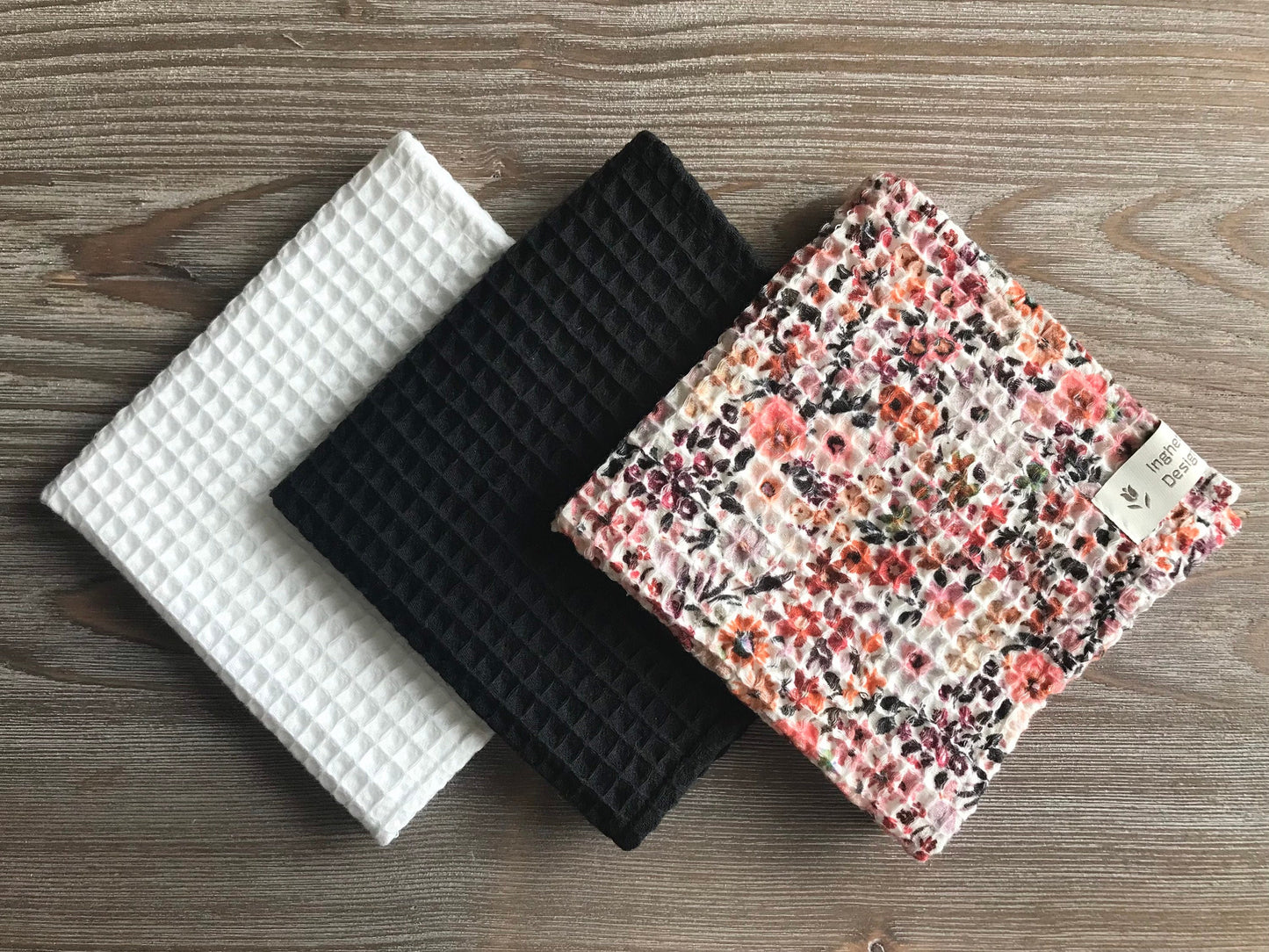 Set of 3 cotton fingertip towels. Waffle weave cotton. Black, white, pink flowers
